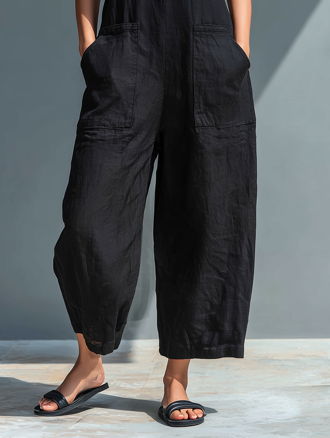 Silvia – Minimalist sleeveless dungarees in a linen blend